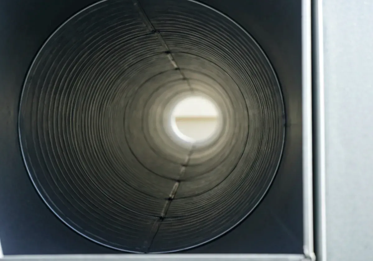 After — air duct cleaning: Dust-loaded supply and return ducts cleaned for measurable airflow gains.